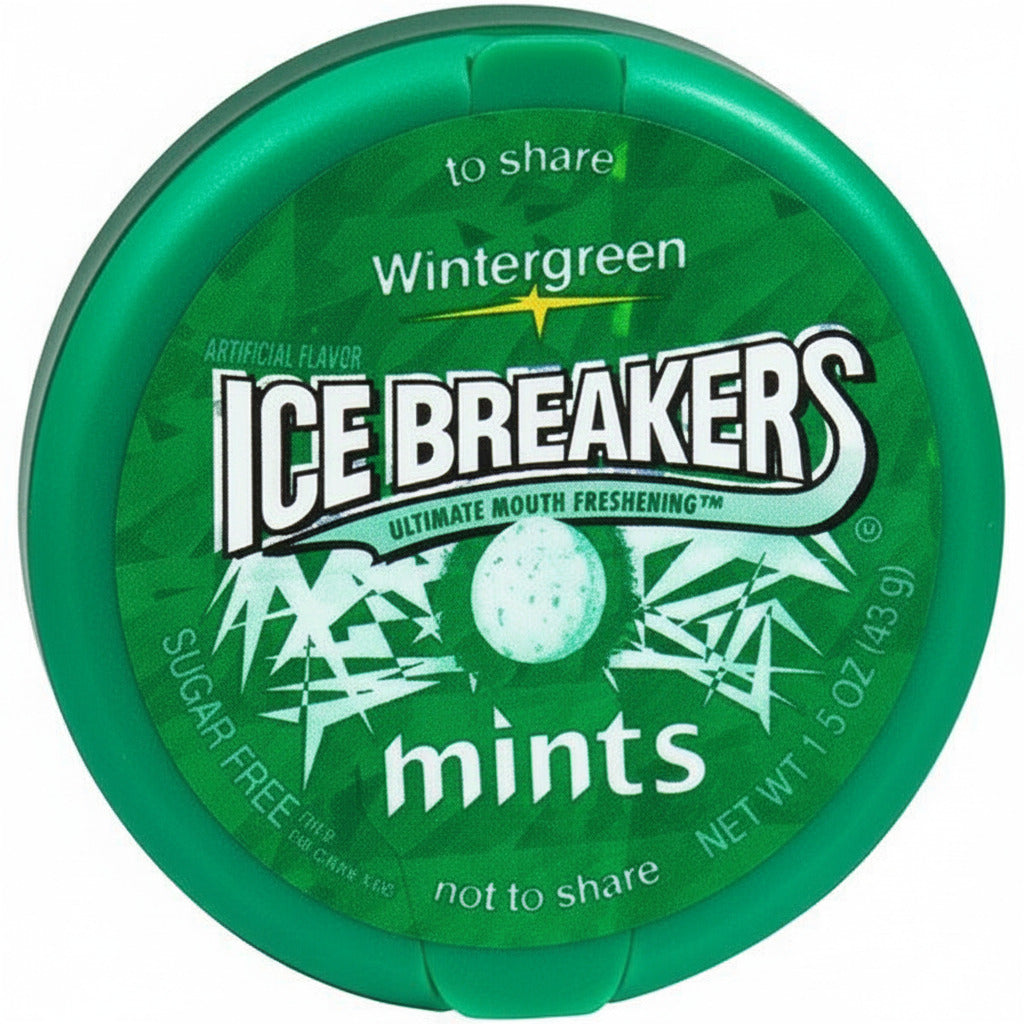 Green container of Ice Breakers Wintergreen mints on a white background
