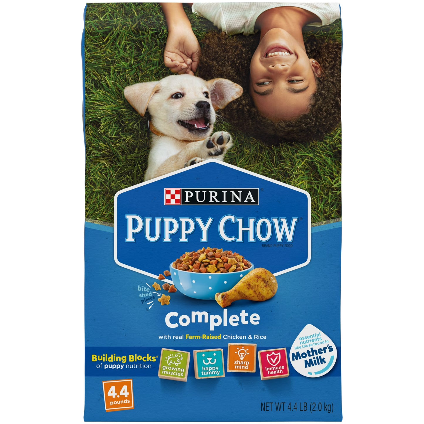 Purina Puppy Chow packaging with a child and puppy on grass