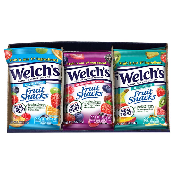 Three packages of Welch's fruit snacks on a white background